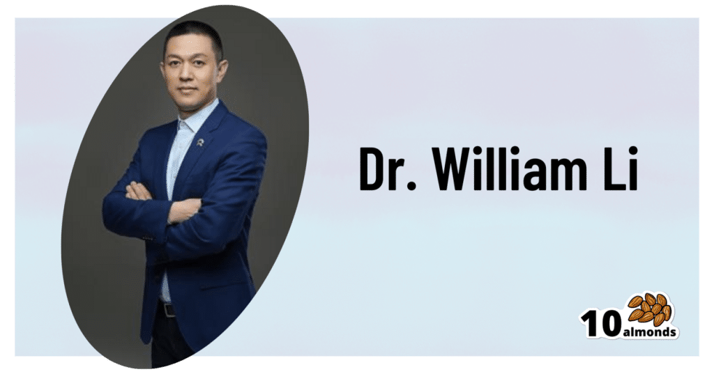 Dr. William Li, known for ways to beat cancer and other diseases, in front of a blue background.