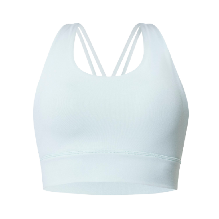 A light blue sports bra with double shoulder straps that crisscross in the back and a scoop neckline. The fabric appears smooth and stretchy, designed for athletic use. With a seamless front, it provides a clean and minimalist look while accommodating various breast shapes for the right bra fit.